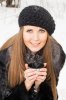 18485434-Portrait-of-dark-blond-young-woman-with-hot-drink-in-winter-Stock-Photo.jpg