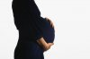 Woman-holding-her-pregnant-stomach.jpg